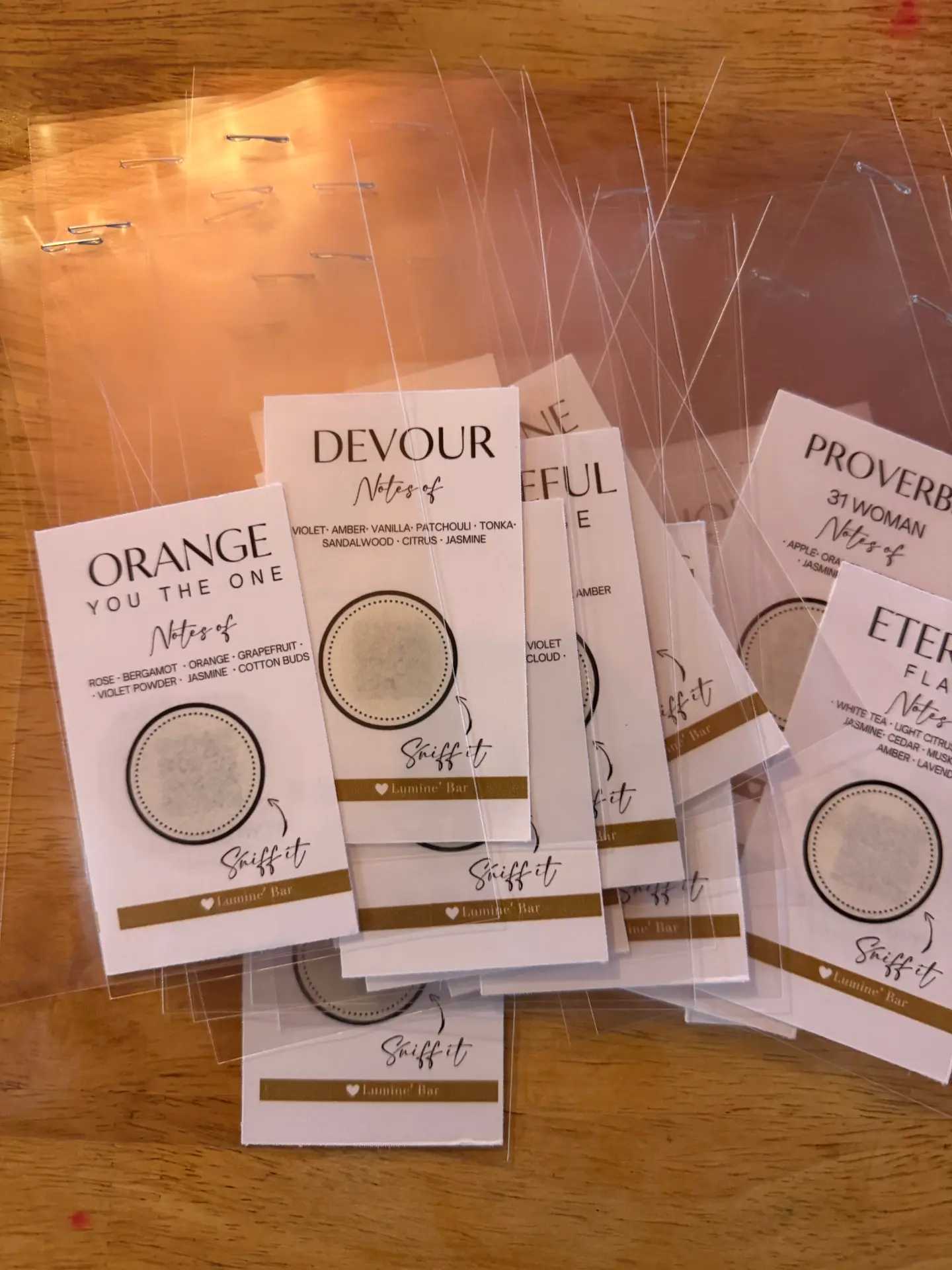 Luminé Bar scent cards with fragrance notes, sealed and ready for guests